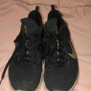 Black and Gold nike running shoes